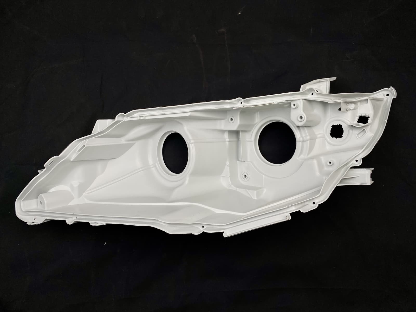 Корпус фари галоген лівий Toyota Camry 50 USA 2012-2014