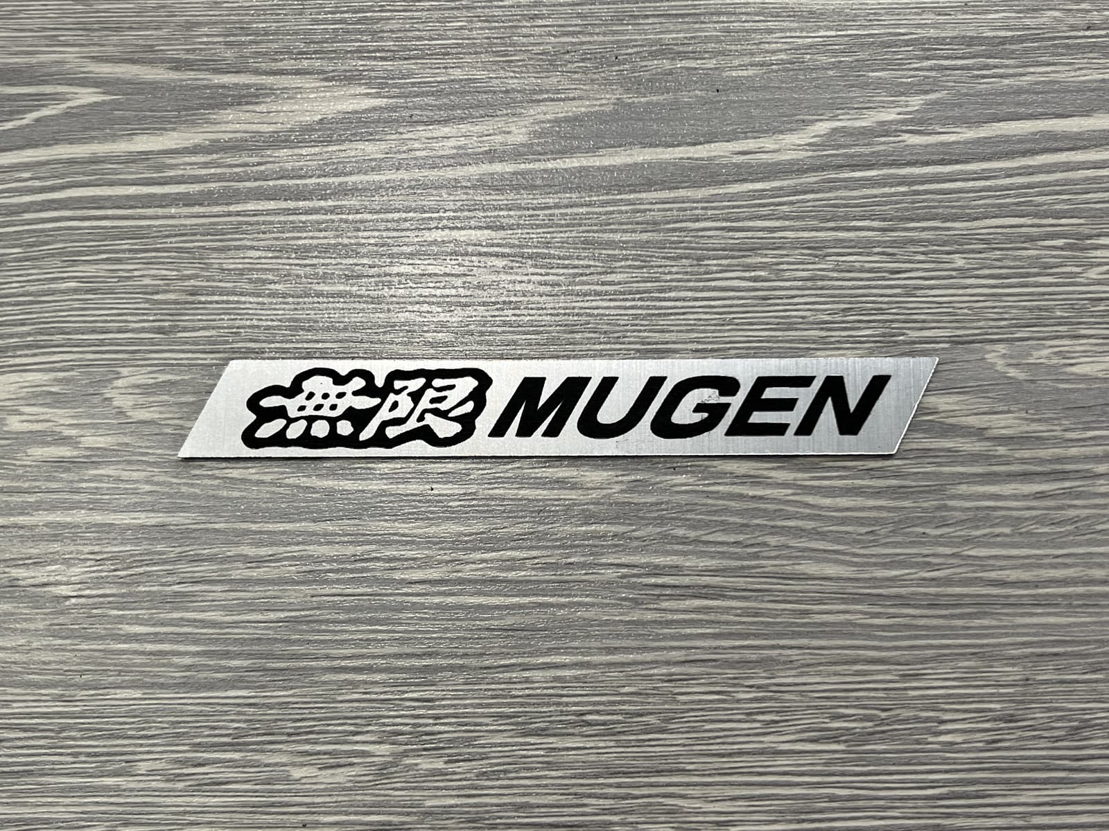 Емблема Mugen для Honda ABS пластик (14см)