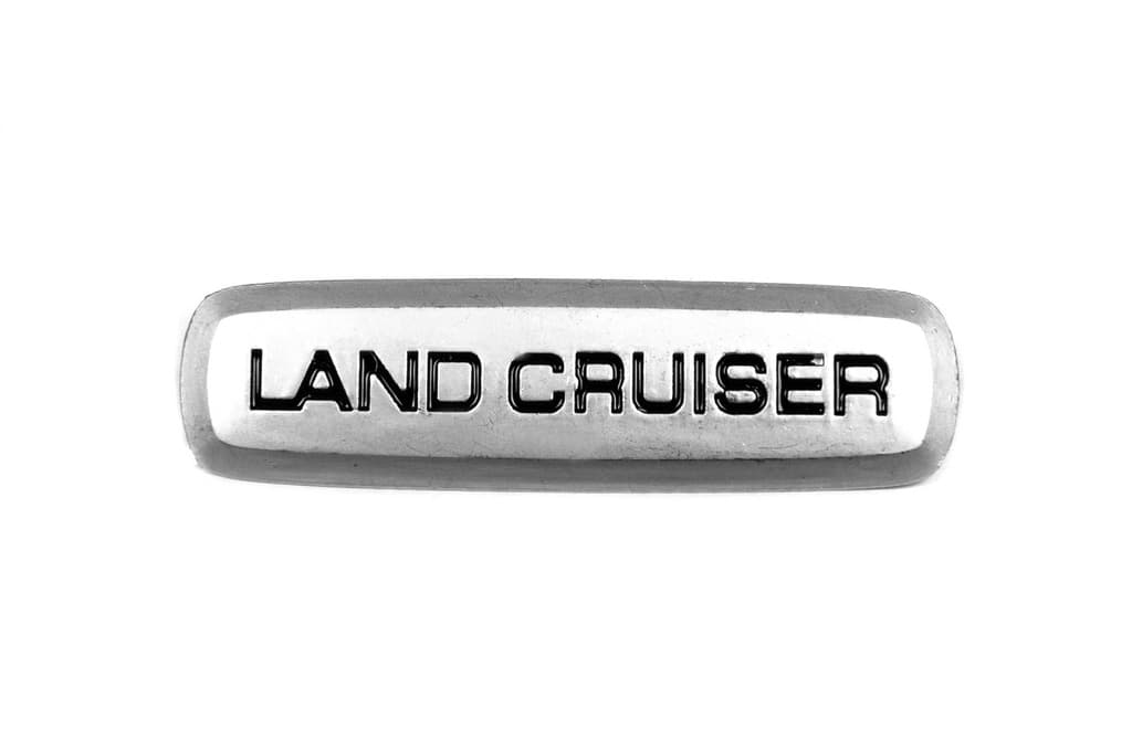 Land Cruiser Шильдик алюмінієвий для килимків (1шт)