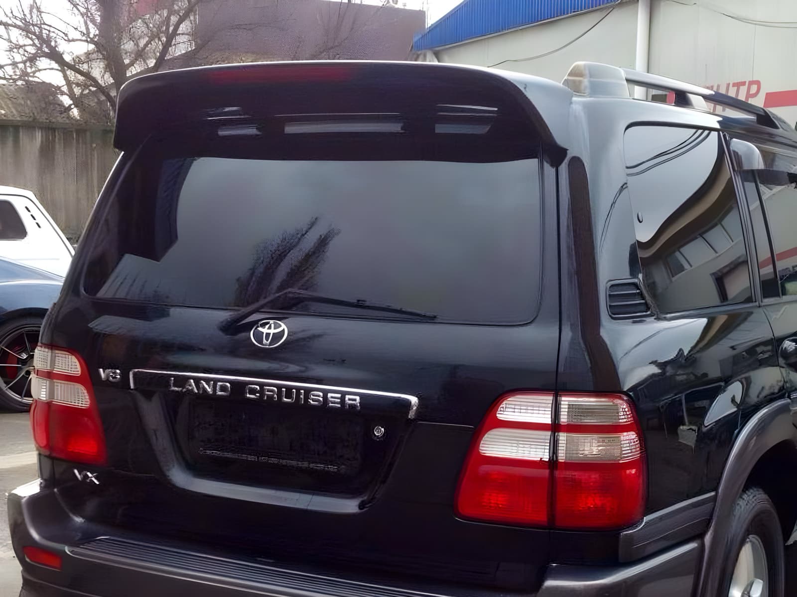 Спойлер козирок Toyota Land Cruiser 100 / Lexus LX 470 1998-2007 ABS пластик колір чорний, модель Maxi