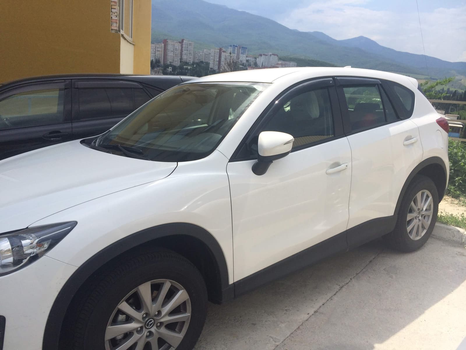 Дефлектори вікон вставні Mazda 323 BJ передні 1998-2002