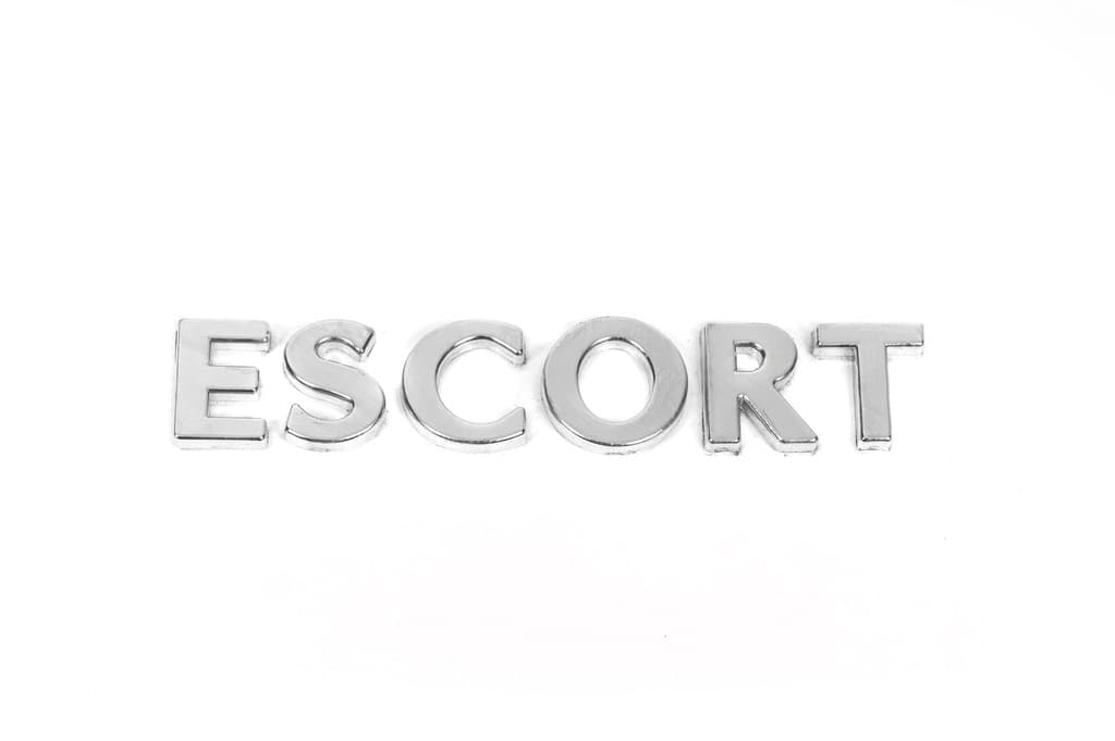 Шильдик Escort