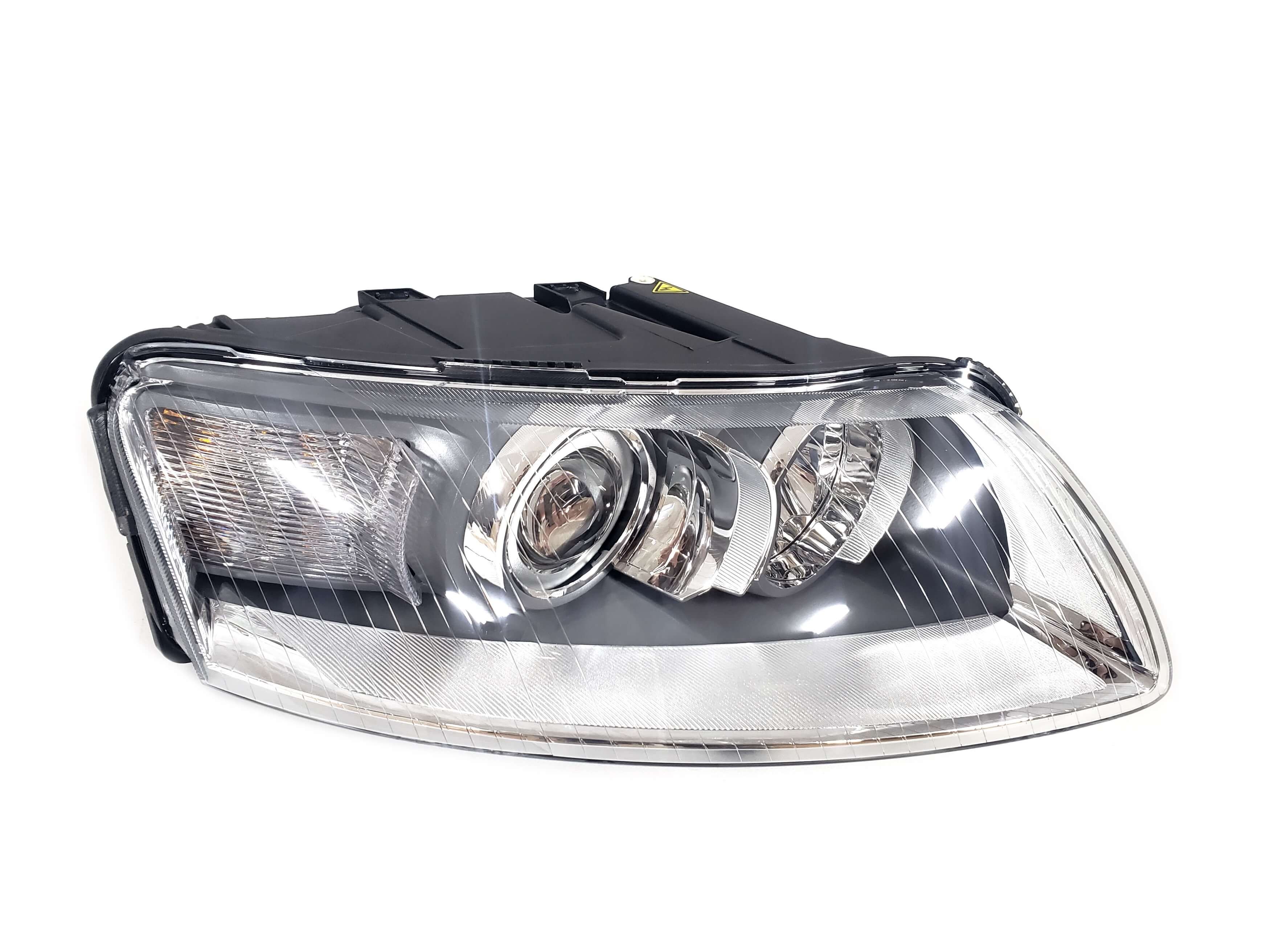 Передні фари (Bi-Xenon дорестайл) без блоків на Audi A6 C6 2004-2011 року 2